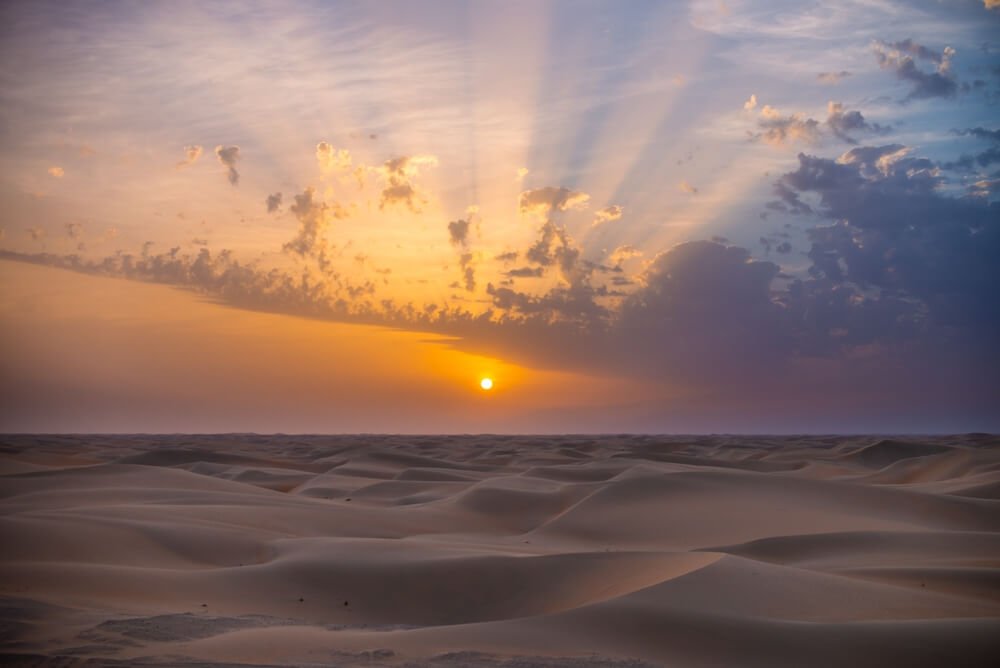 A mobile tent safari in Merzouga, showcasing luxury desert camping under the stars in the Sahara Desert